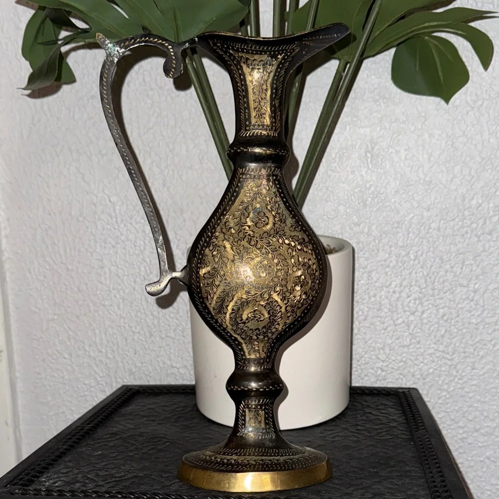 This is a‎ vintage decorative etched brass pitcher or ewer.
